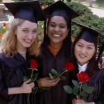 3 women college graduates on graduation day